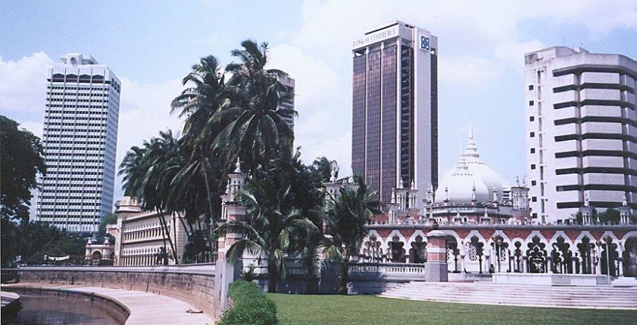 High rise buildings surrounding Masjid Jame ( The Friday Mosque ) in Kuala Lumpur