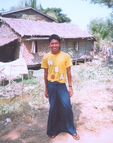 Chicha ( private tourist guide ) in home town of Dalah on Yangon River in Yangon ( Rangoon ) in Myanmar ( Burma )