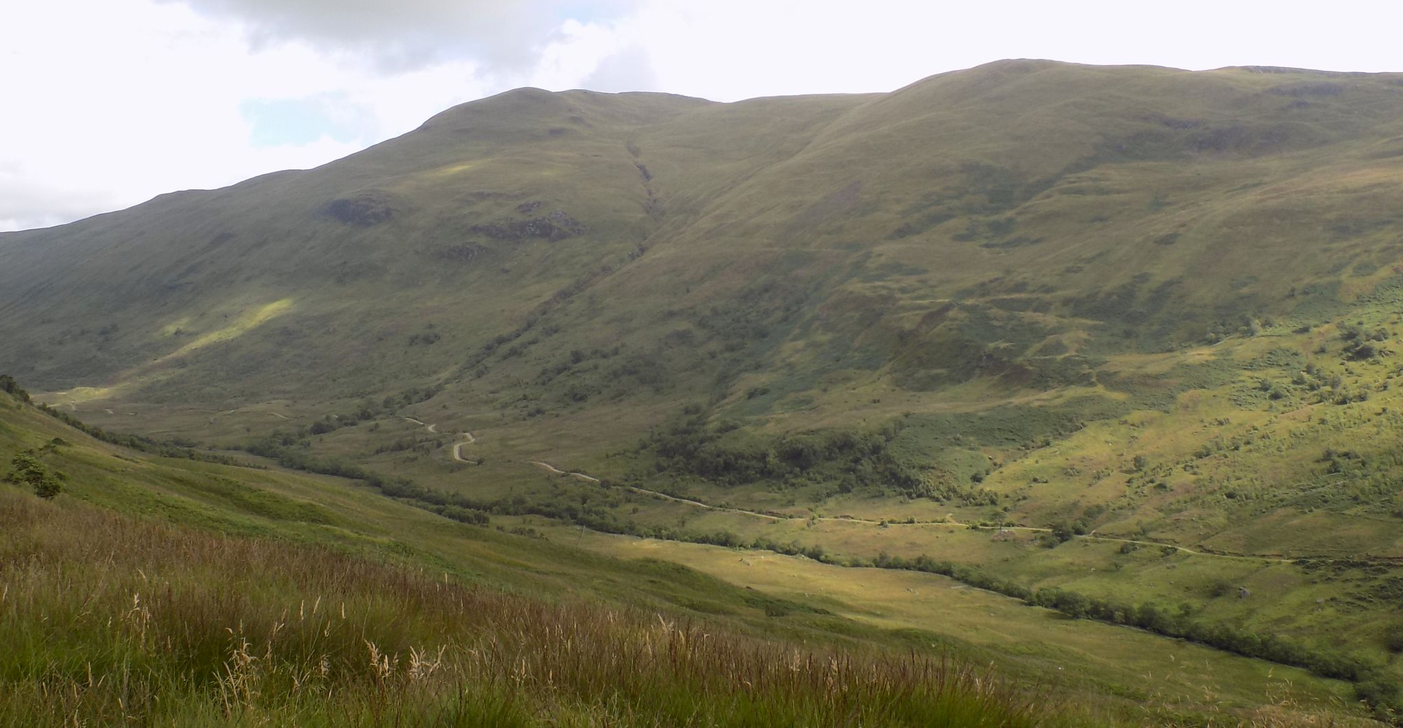 Ben Vane above the Allt Gleanne nam Meann on ascent of Meall Cala