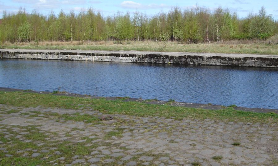 Cobblestone pathway alongside canal at Port Dundas